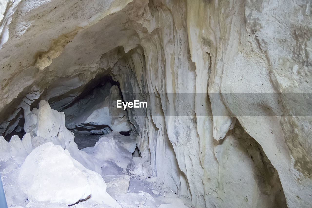 geology, rock, beauty in nature, no people, cave, nature, rock formation, cold temperature, ice, physical geography, stalactite, non-urban scene, day, outdoors, tranquility, winter, frozen, snow, rough, pattern, textured, scenics - nature, environment, travel destinations