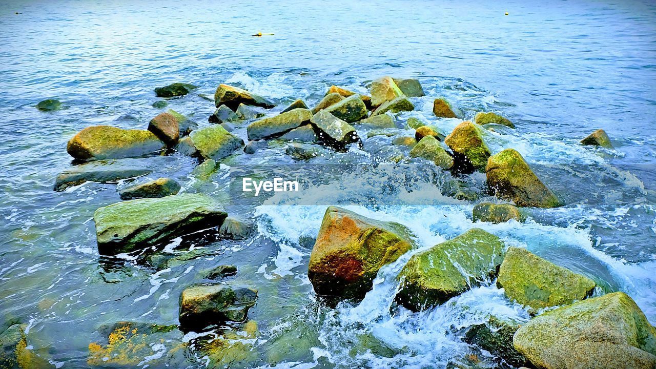 ROCKS ON SEA SHORE