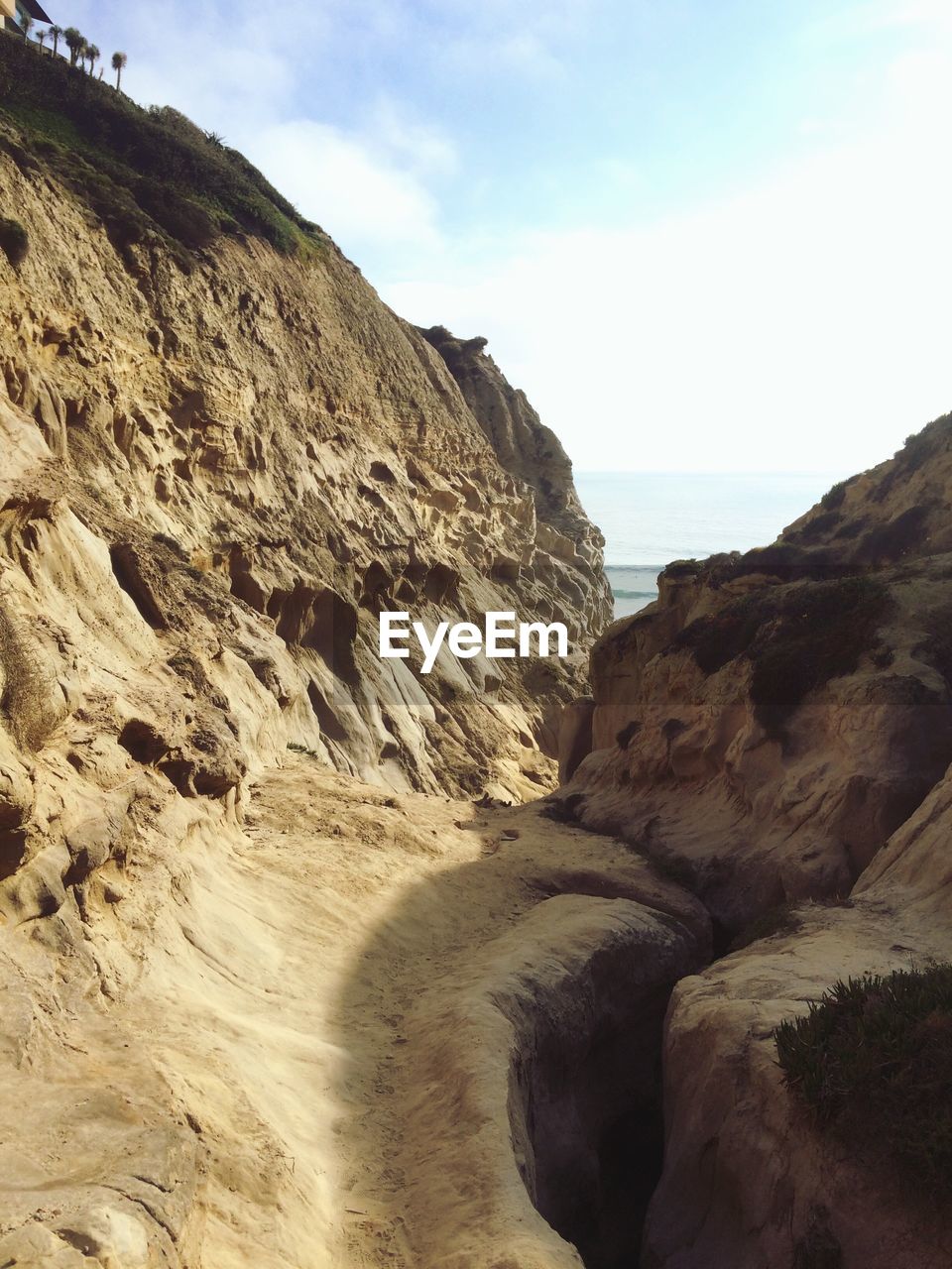 Trail passing through dirt hills