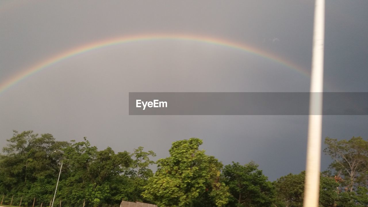 RAINBOW AGAINST SKY