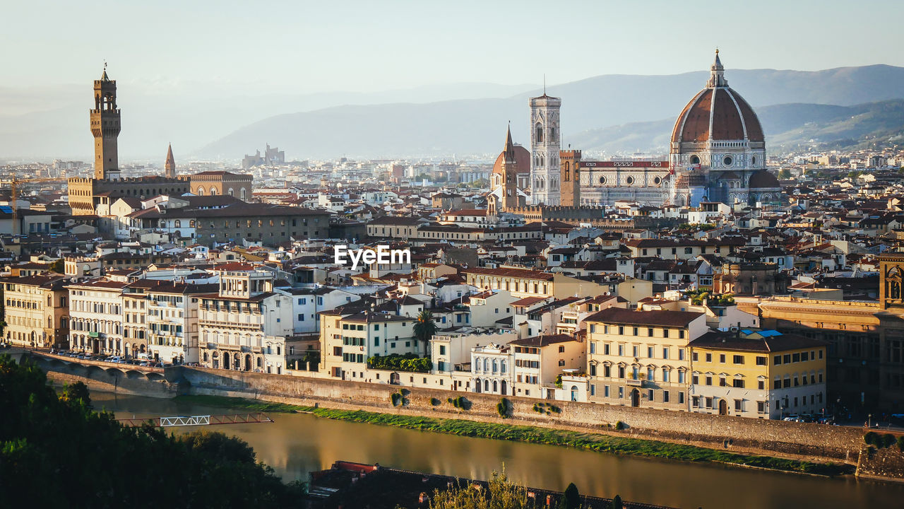 Florence city. panoramic view to the river arno, with ponte vecchio, palazzo vecchio and cathedral 
