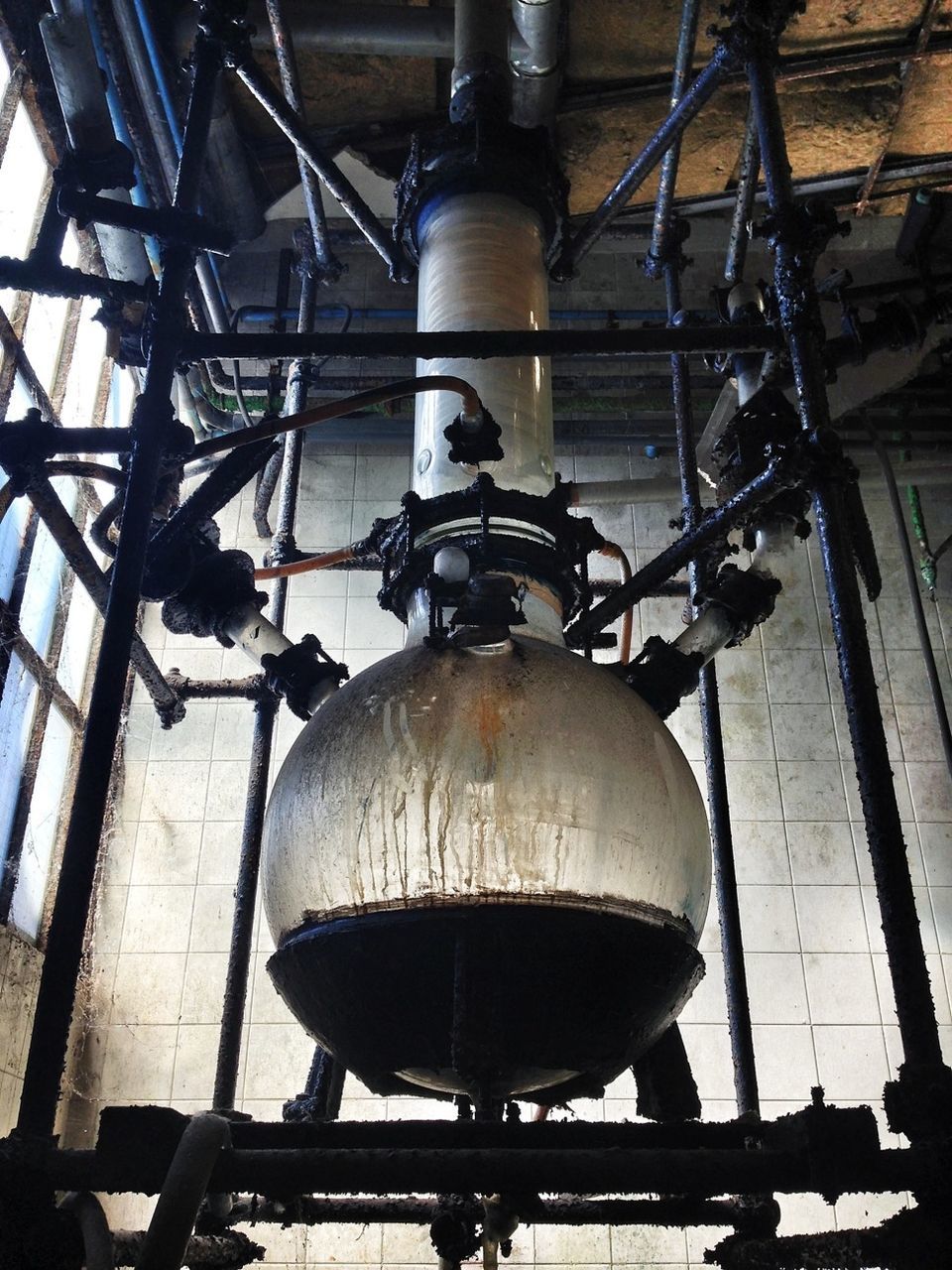 Low angle view of machinery in factory