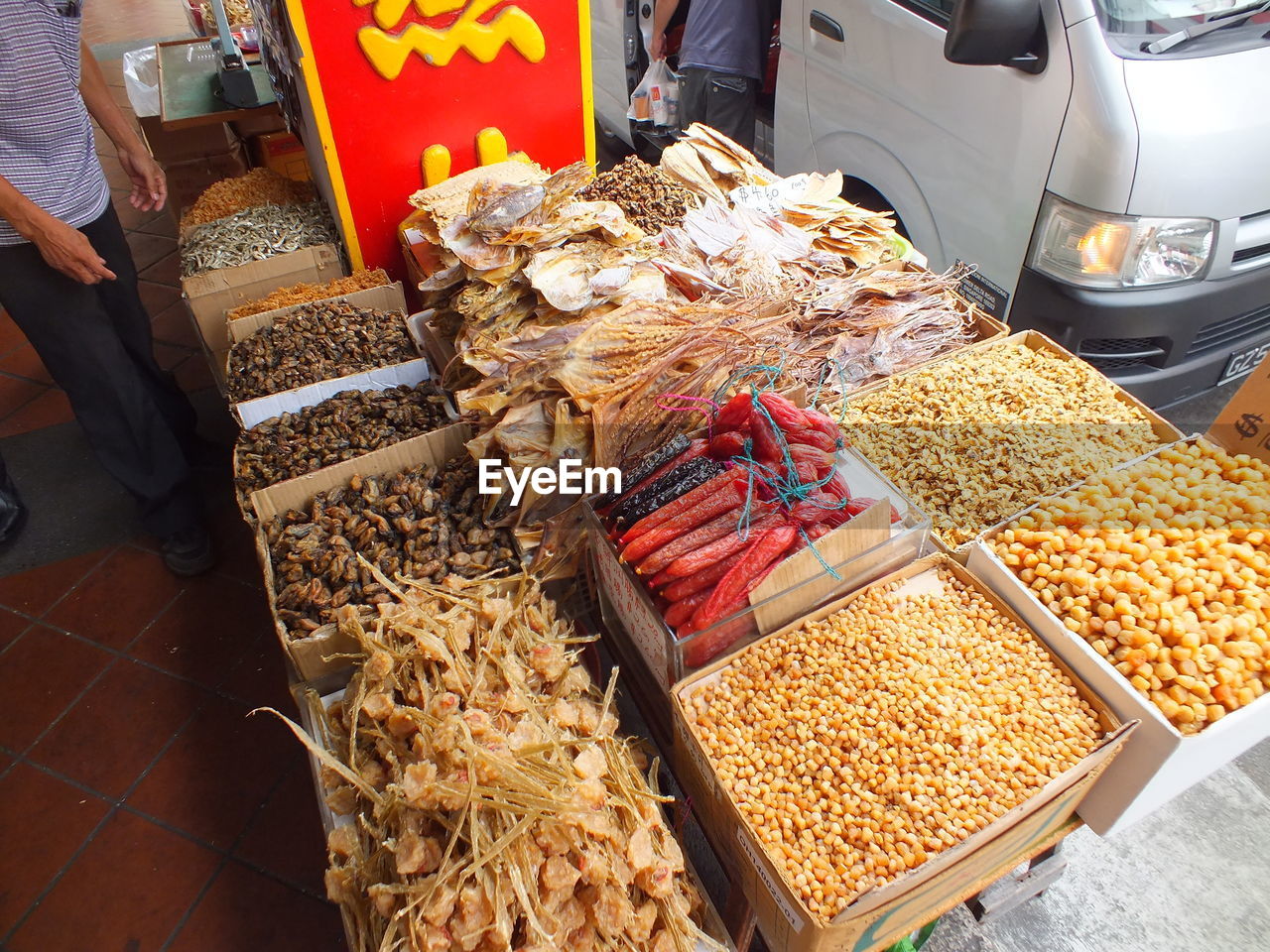 High angle view of food for sale in market dried fish