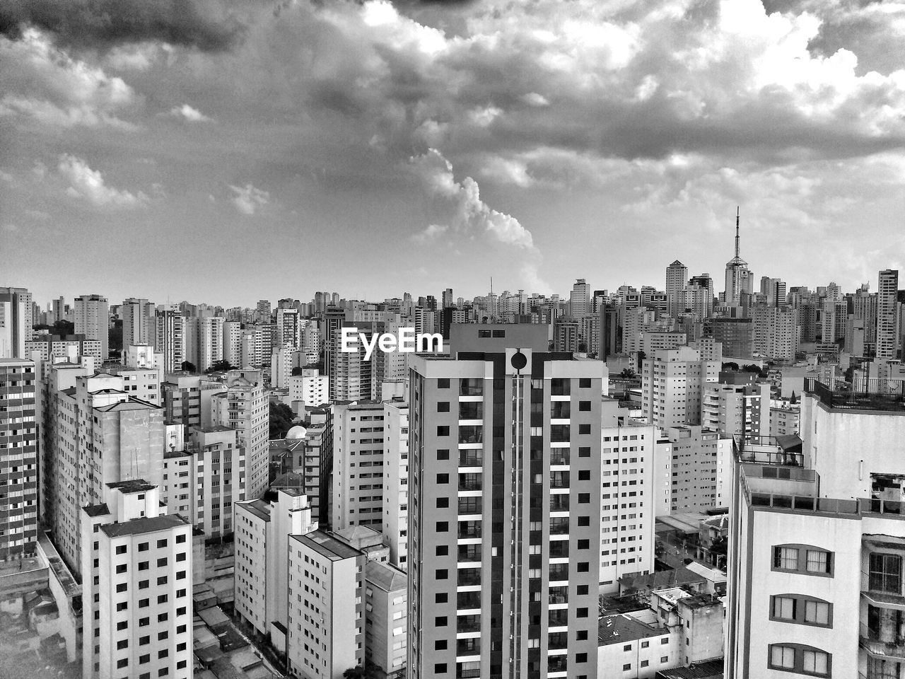 High angle view of buildings in city against sky