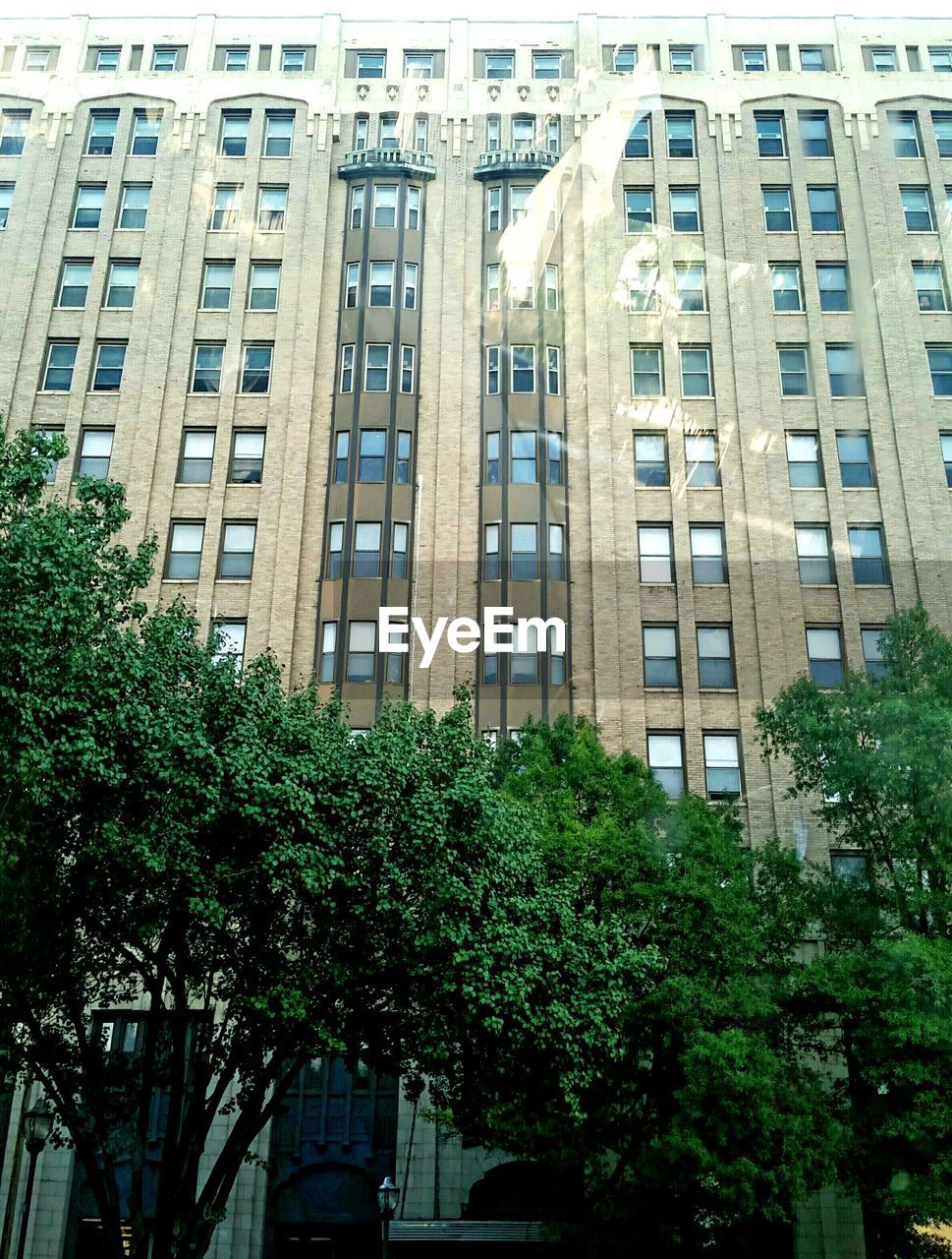 LOW ANGLE VIEW OF RESIDENTIAL BUILDING