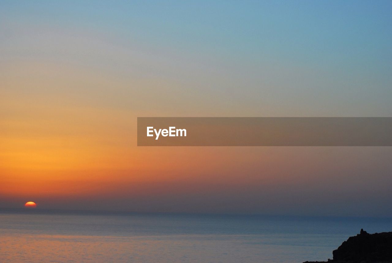 View of sea against sky during sunset