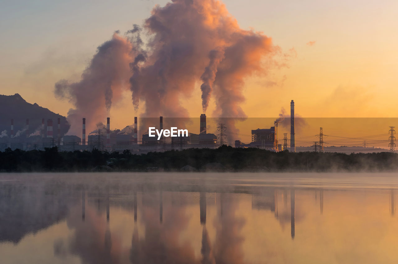 Smoke emitting from factory against sky, coal power plant