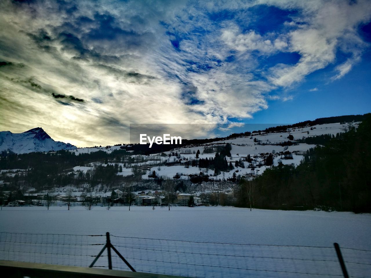 SCENIC VIEW OF MOUNTAINS AGAINST BLUE SKY