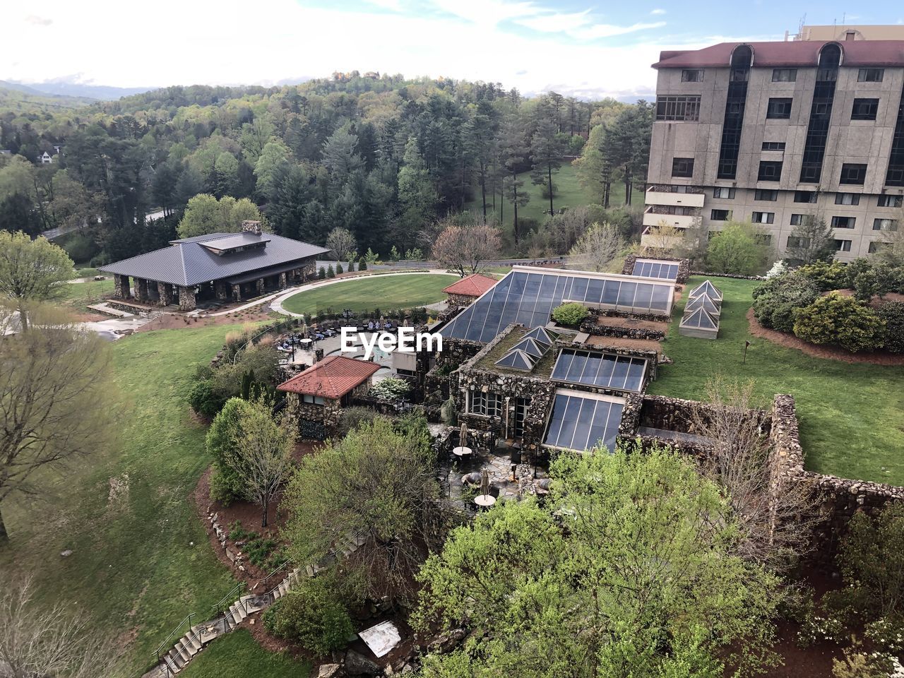 High angle view of trees and buildings against sky