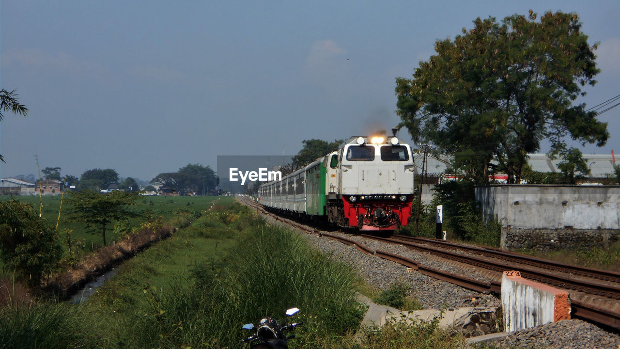 TRAIN ON RAILROAD TRACK