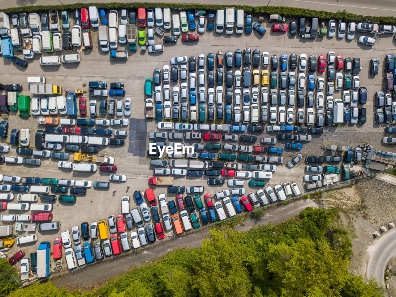 Aerial view of colorful cars parked on parking lot