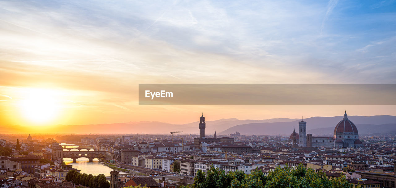 Panoramic view of the sunset over florence from the piazzale michelangelo.