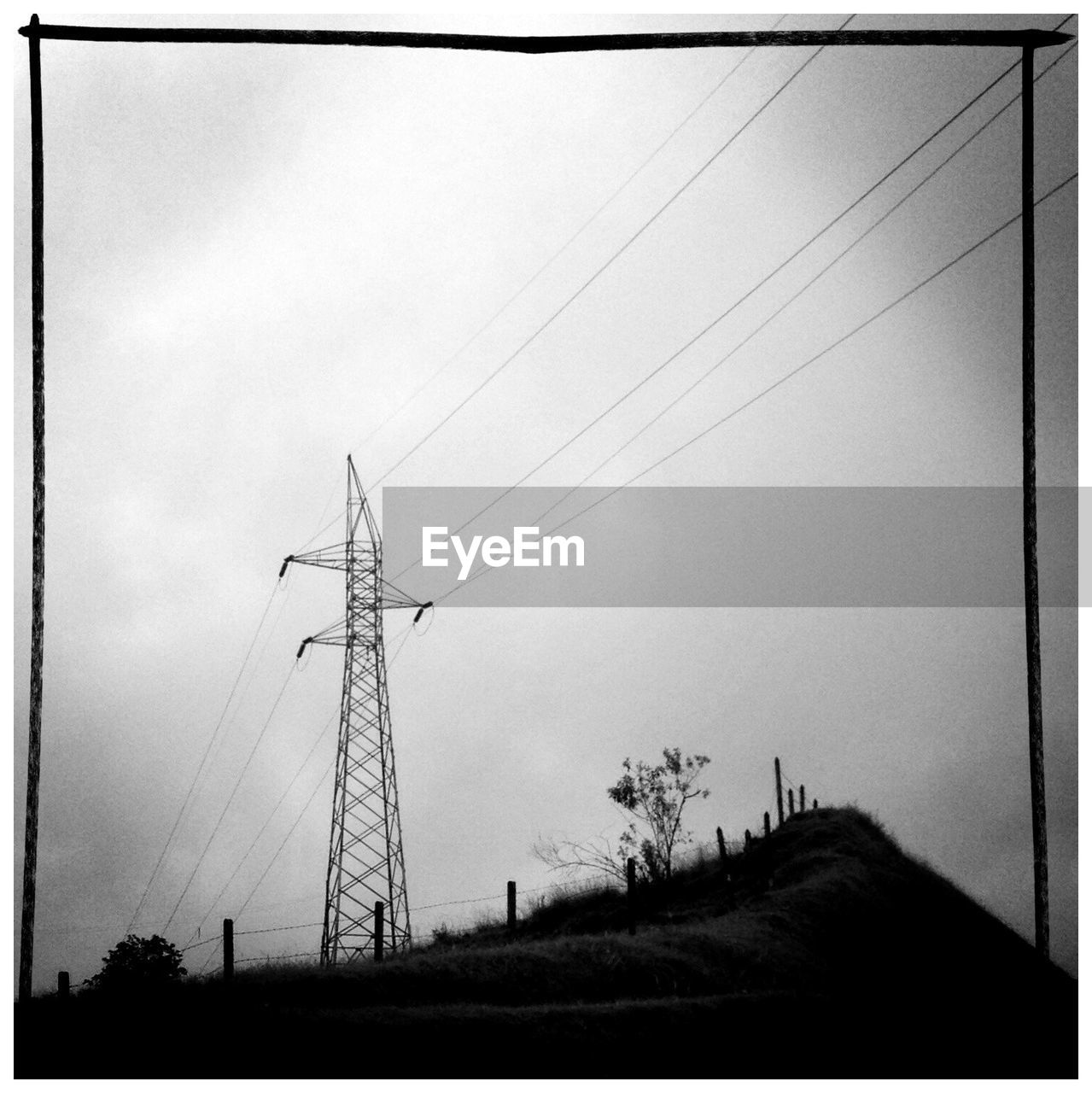 Low angle view of electricity pylon