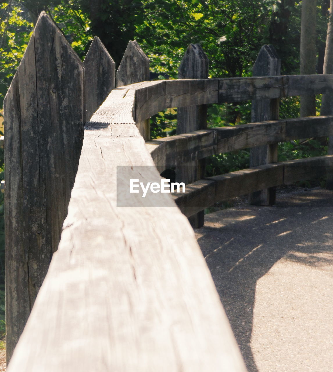 WOODEN BRIDGE OVER RIVER