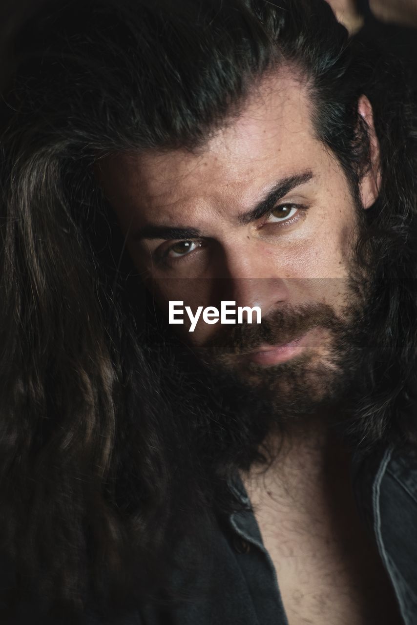 Close-up portrait of bearded man