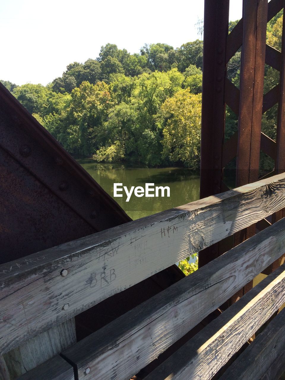 VIEW OF BUILT STRUCTURE WITH TREES IN BACKGROUND