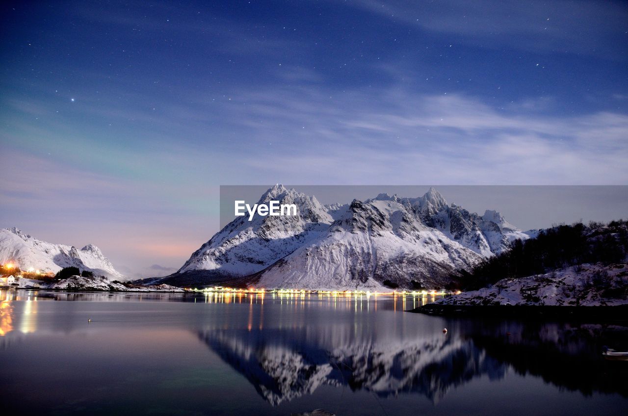 Scenic view of snowcapped mountains against sky during winter