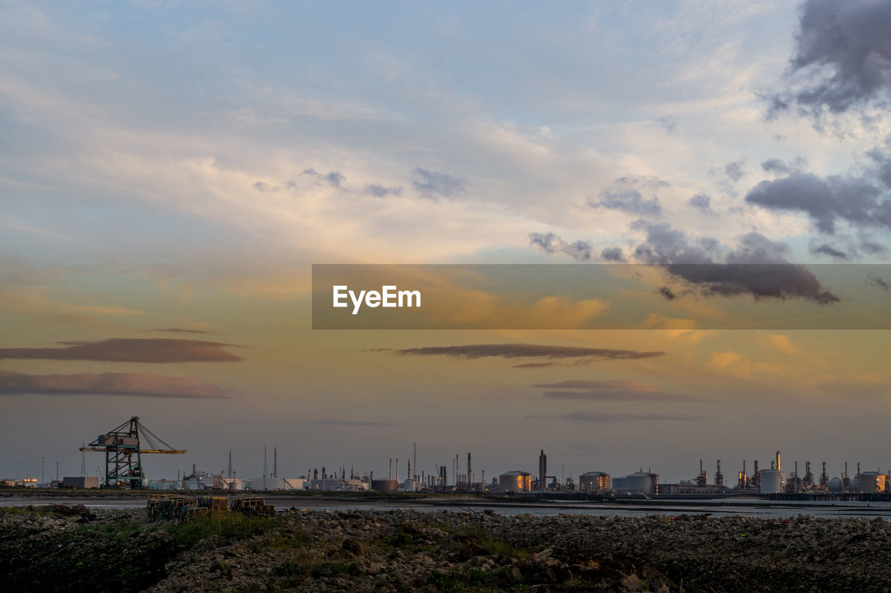 BUILDINGS AGAINST SKY DURING SUNSET