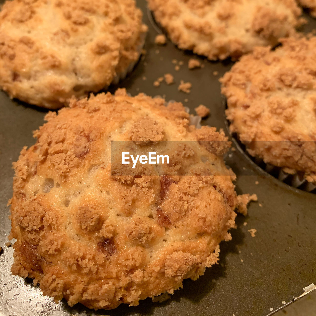 Macro of freshly baked streusel muffins