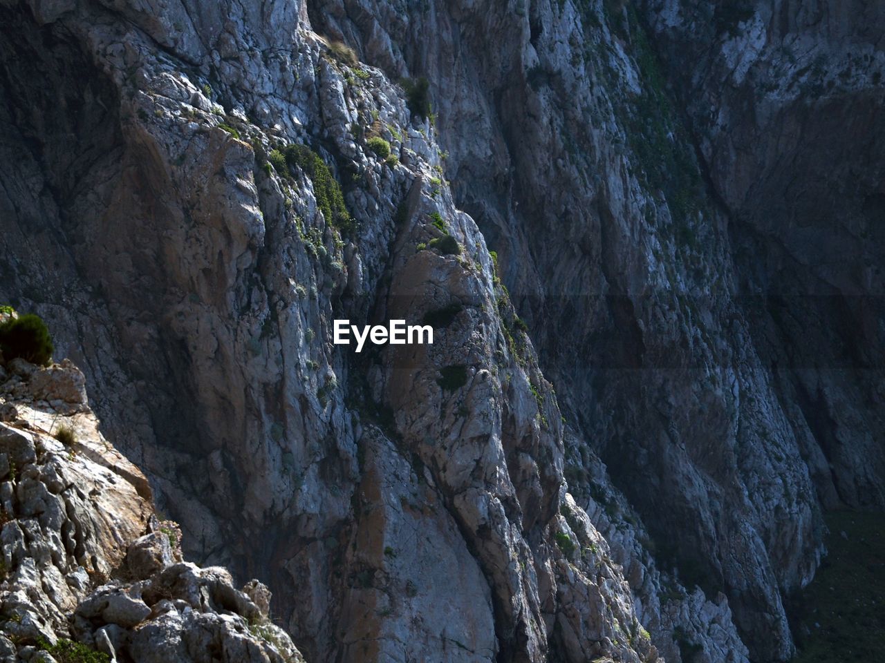 Low angle view of rocky mountain