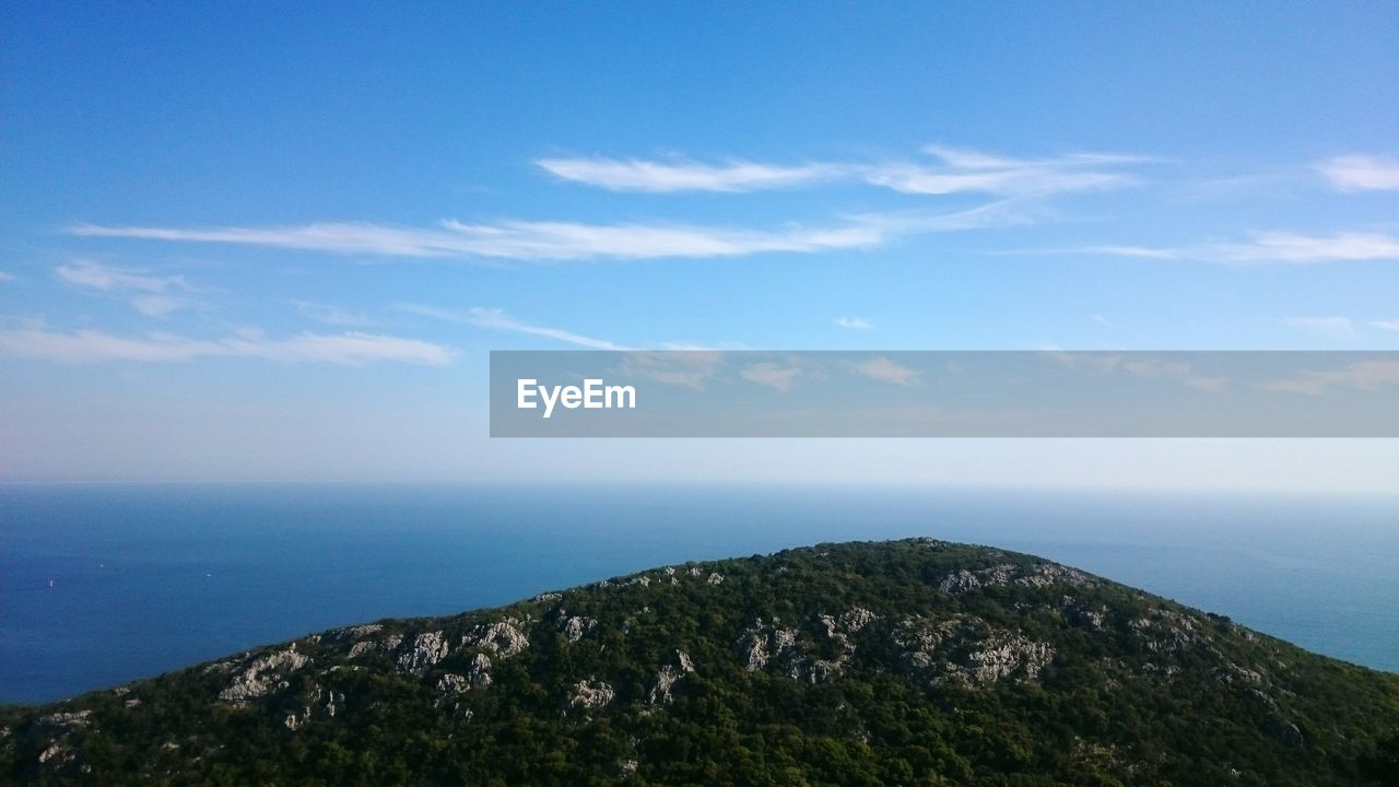 Scenic view of sea and blue sky