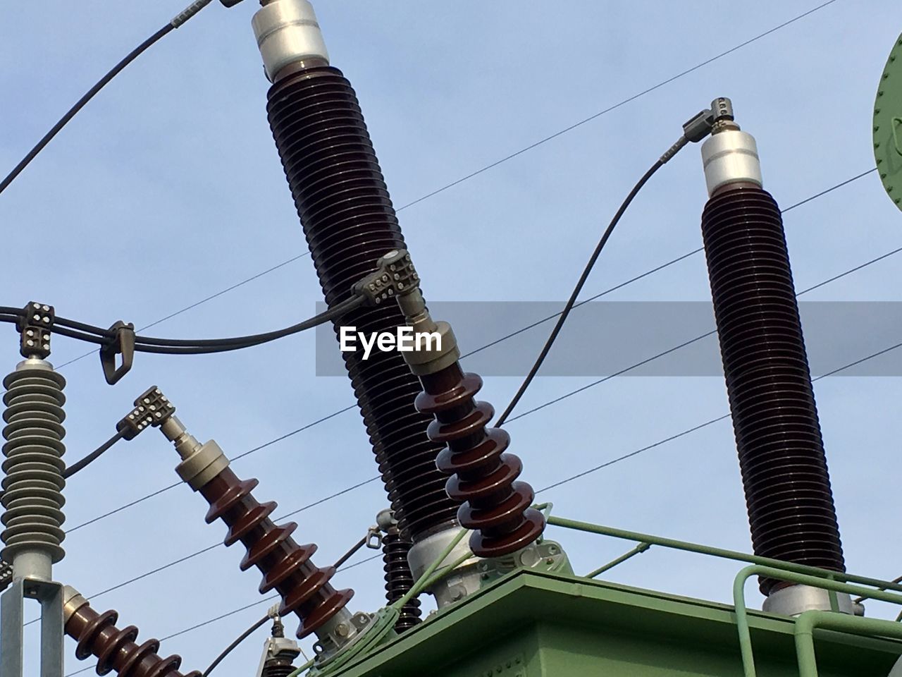 LOW ANGLE VIEW OF POWER LINES AGAINST SKY