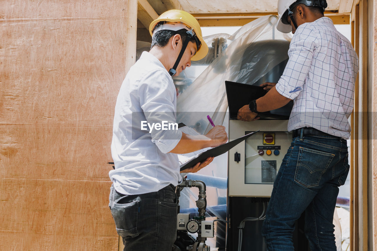 Project engineer, engineer and technician working on construction site