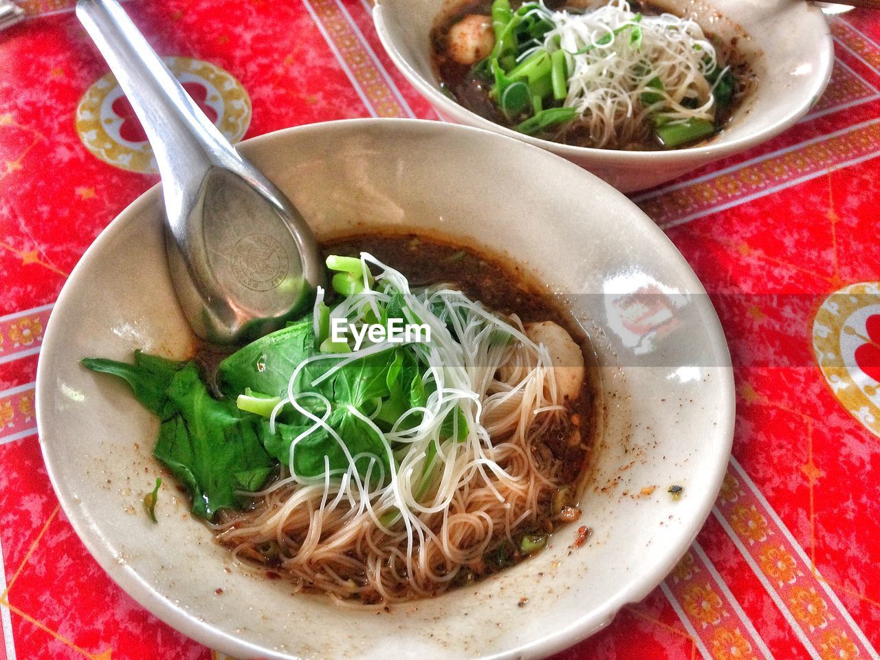 CLOSE-UP OF SOUP IN BOWL ON TABLE