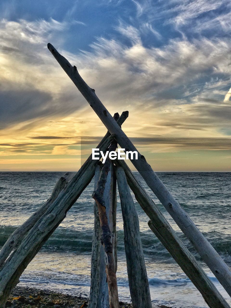 Scenic view of sea against sky at sunset