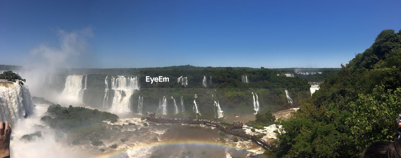 WATER SPLASHING AGAINST CLEAR SKY