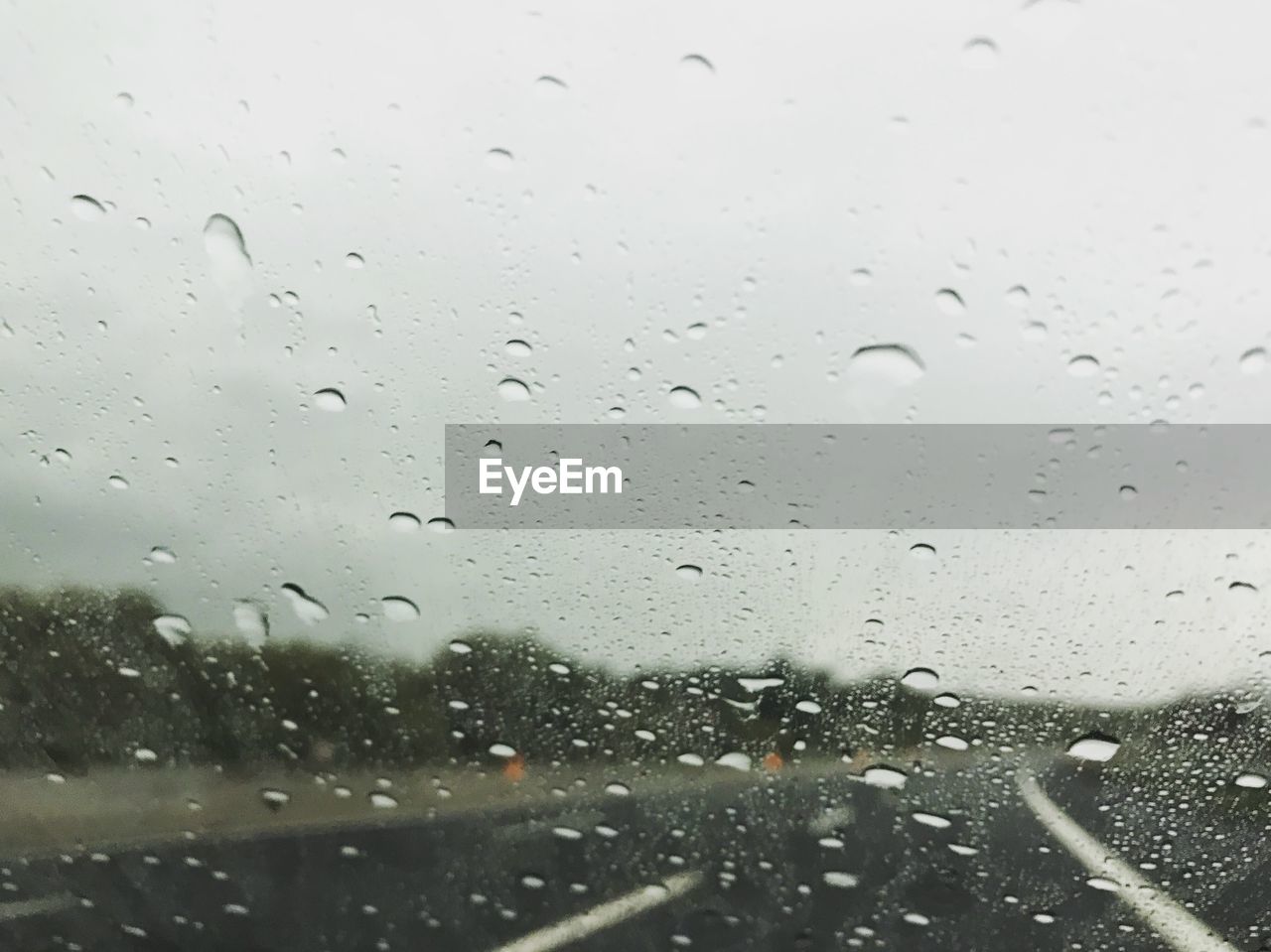 RAINDROPS ON GLASS WINDOW