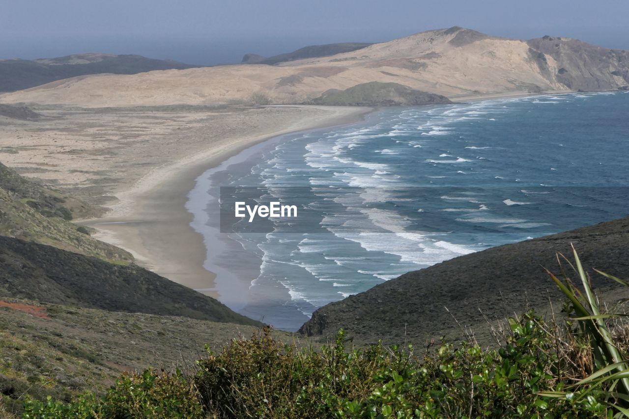 SCENIC VIEW OF SEA AND MOUNTAINS