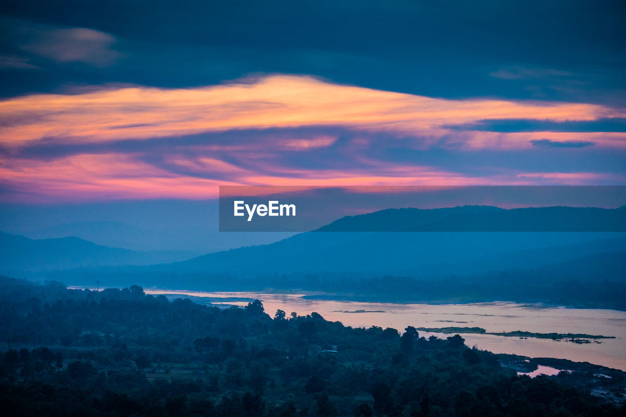 Scenic view of dramatic sky during sunset