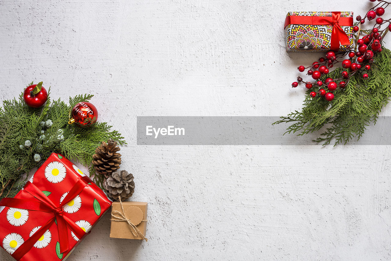 Christmas decoration and presents on table