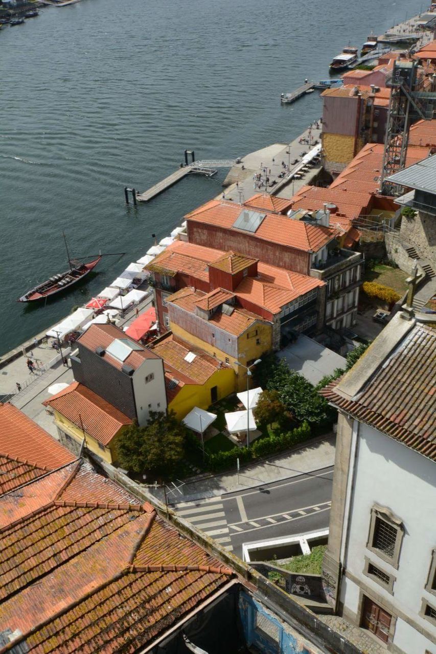 High angle view of houses by sea