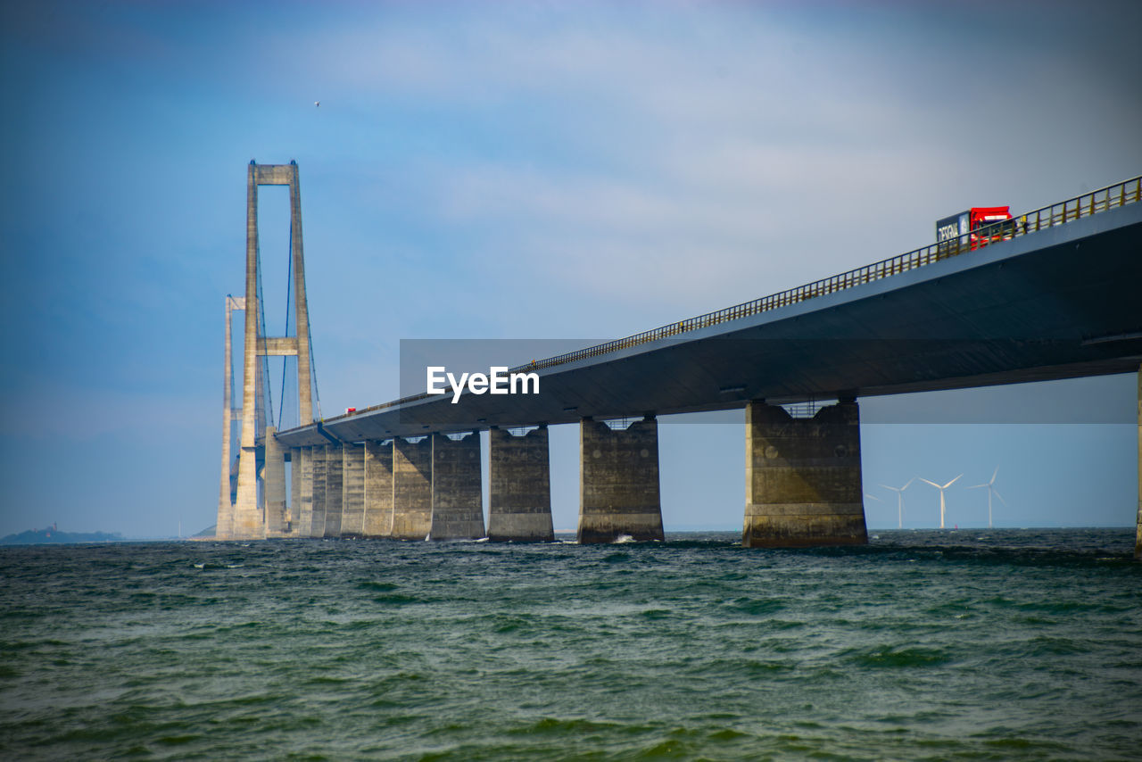 ARCH BRIDGE OVER SEA AGAINST SKY