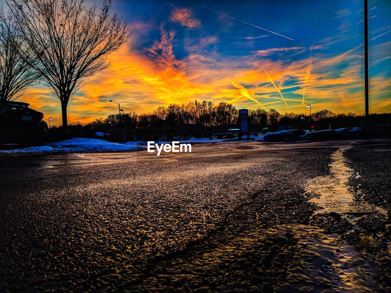 ROAD AGAINST SKY DURING SUNSET