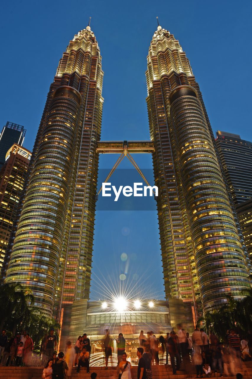 LOW ANGLE VIEW OF BUILDINGS AGAINST SKY