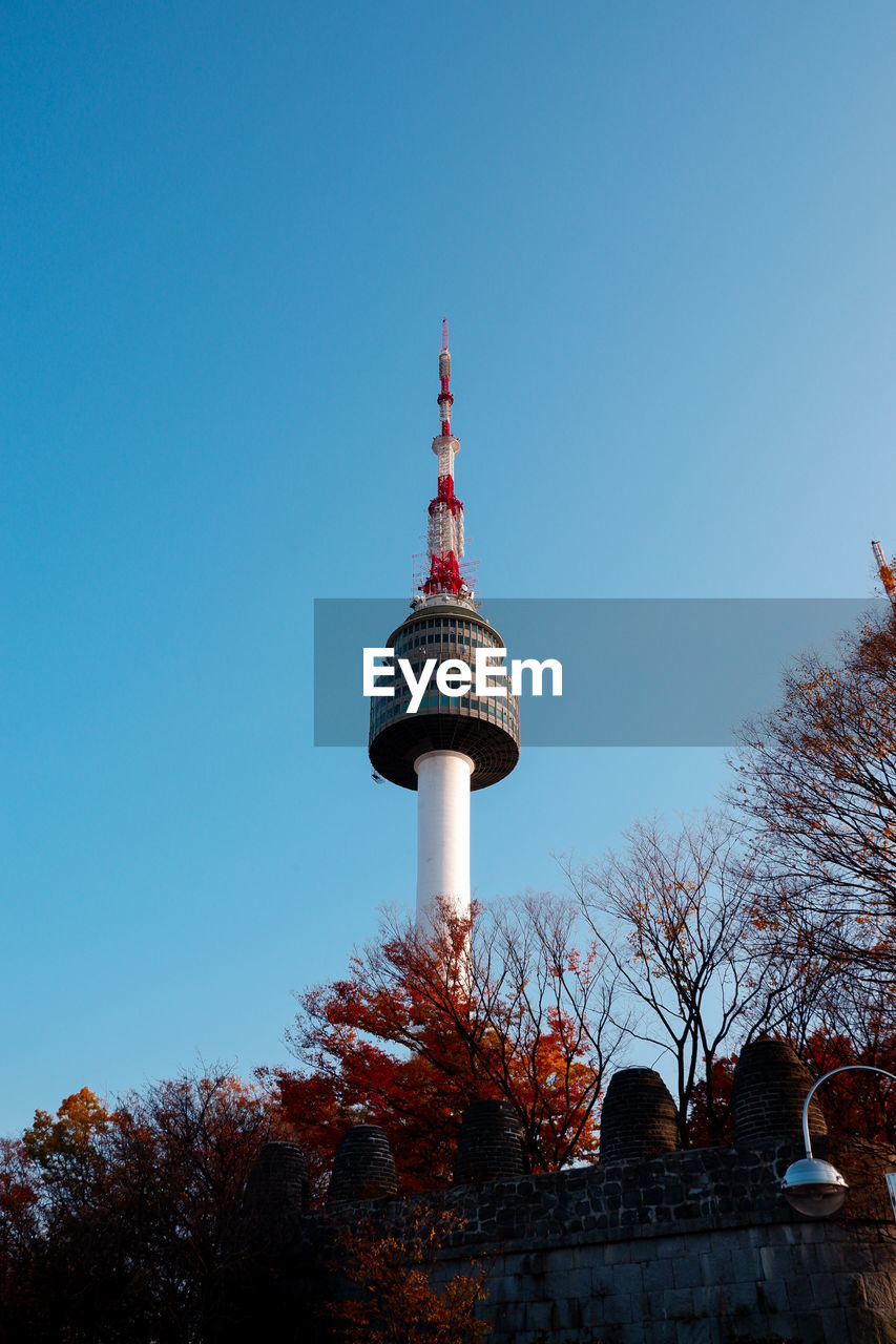 Low angle view of communications tower against sky, namsan tower in seoul, south korea