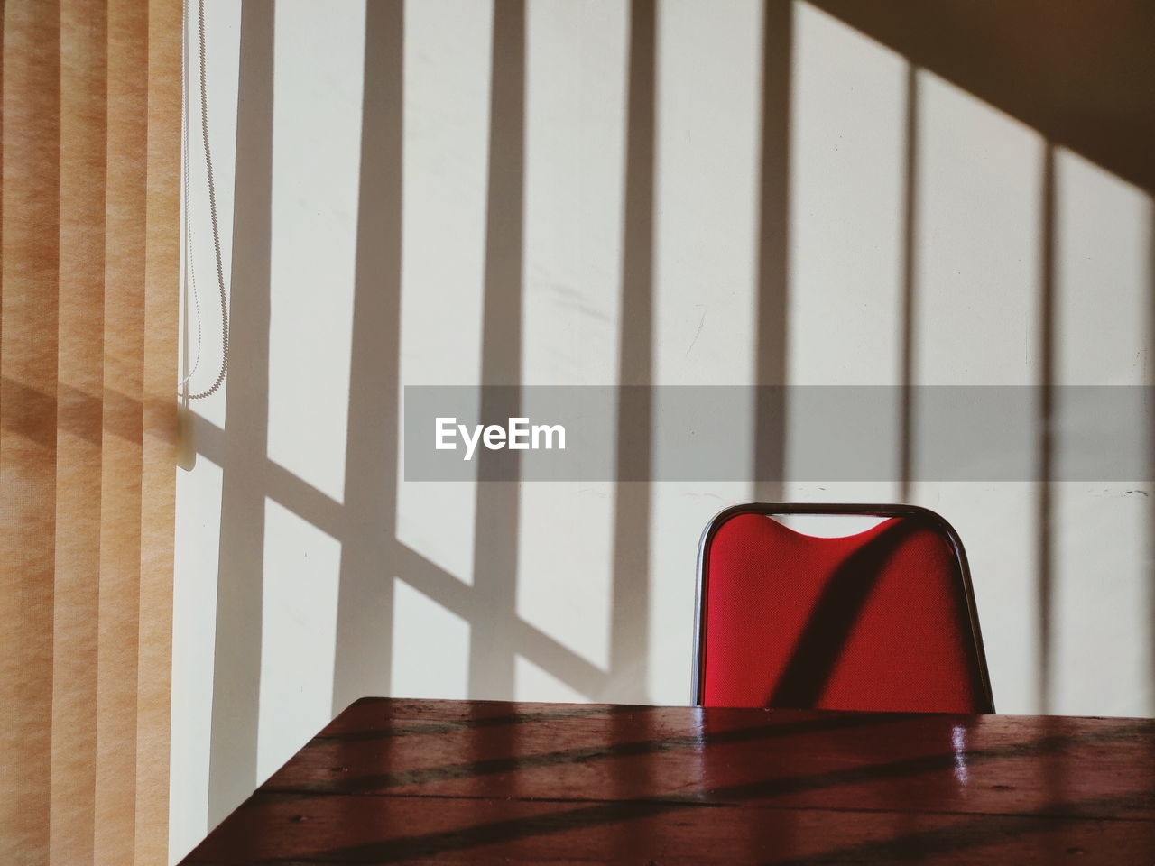 Close-up of chair on table at home