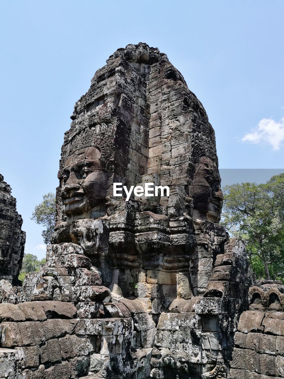 LOW ANGLE VIEW OF BUDDHA STATUE