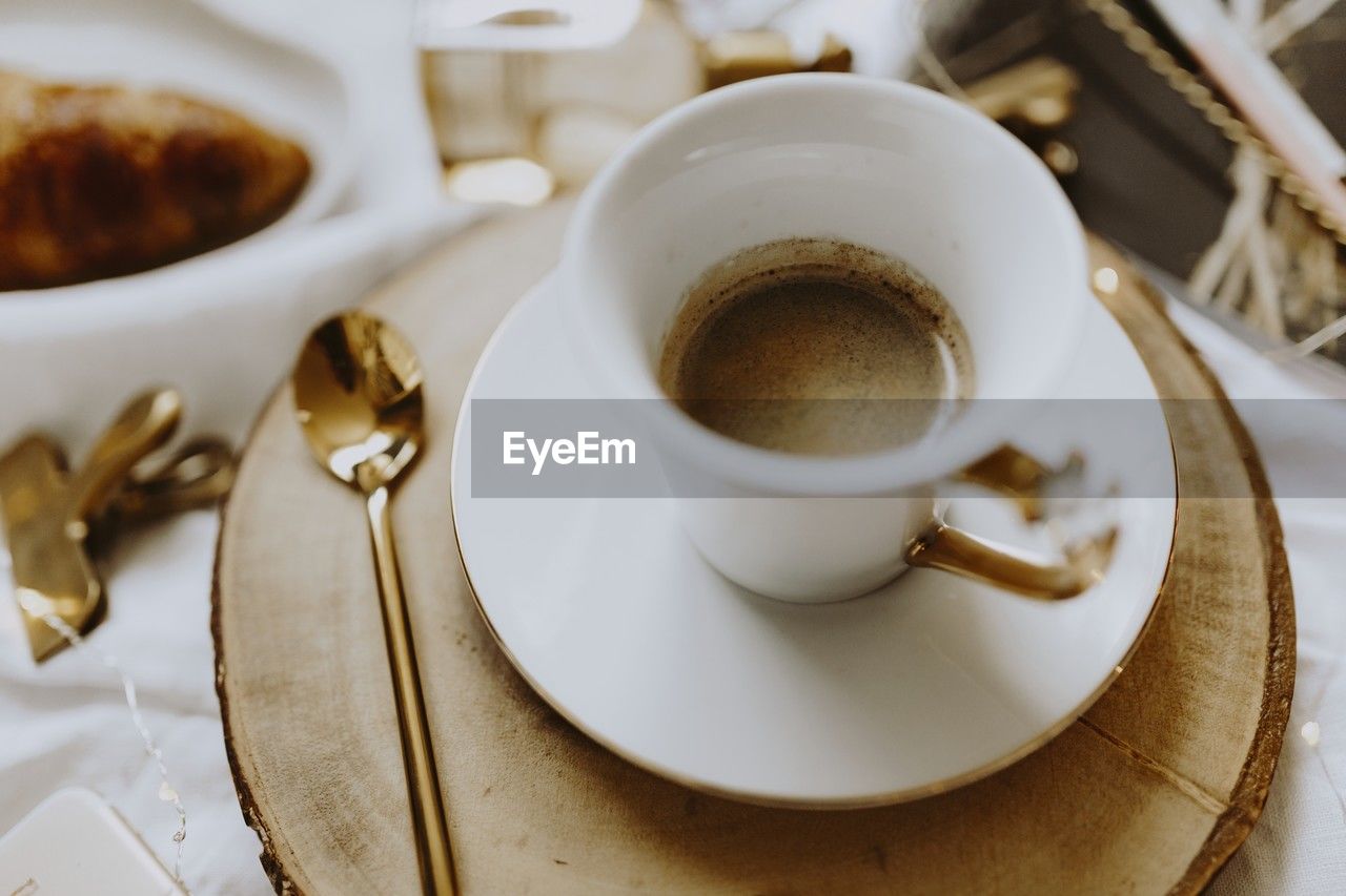 high angle view of coffee and drink on table