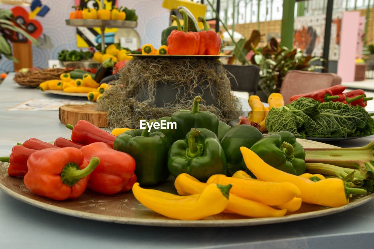 vegetable, food, food and drink, healthy eating, pepper, bell pepper, freshness, wellbeing, variation, meal, produce, no people, multi colored, fruit, pepper - vegetable, red bell pepper, yellow, capsicum, dish, yellow pepper, plant, zucchini, spice, yellow bell pepper, tomato, indoors