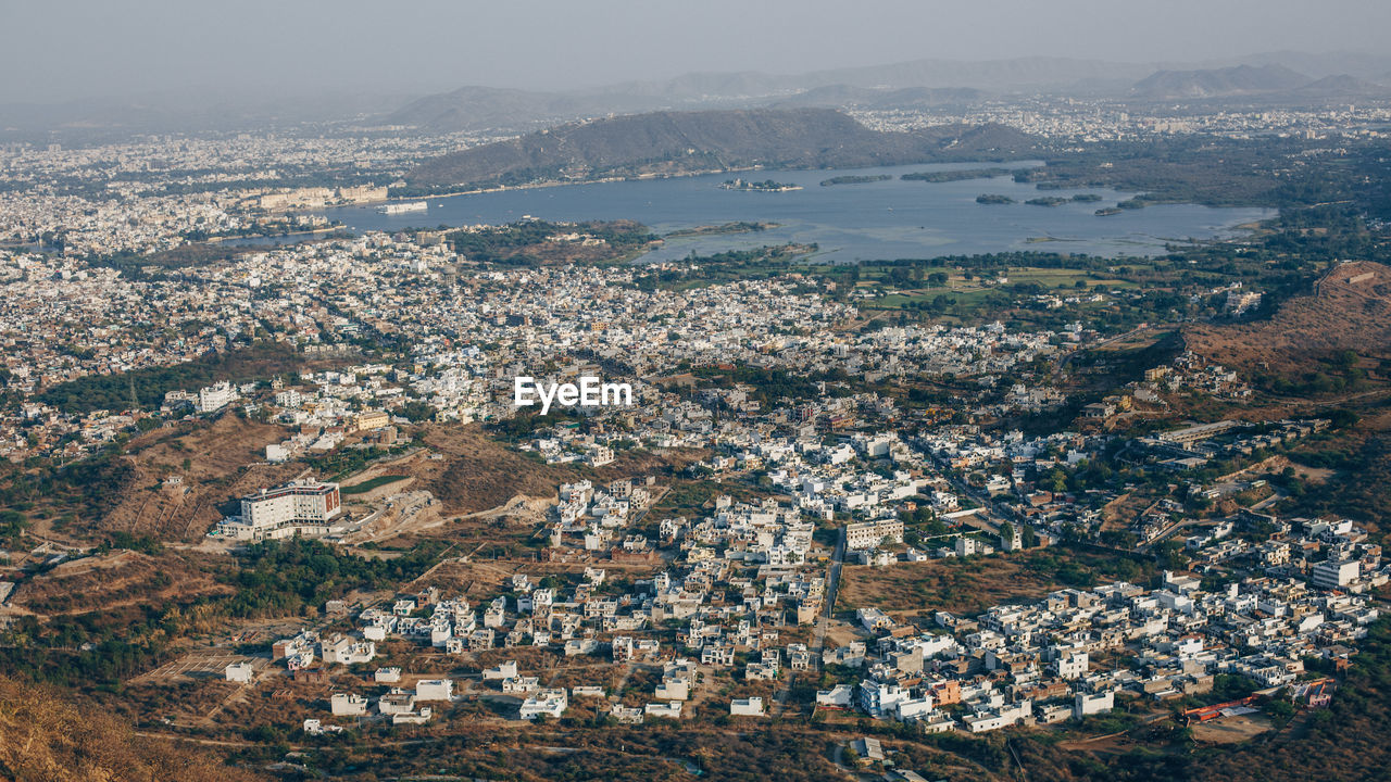 Aerial view of cityscape against sky