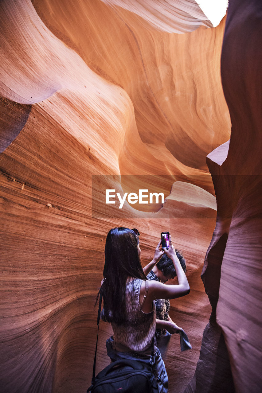 Women photographing at antelope canyon