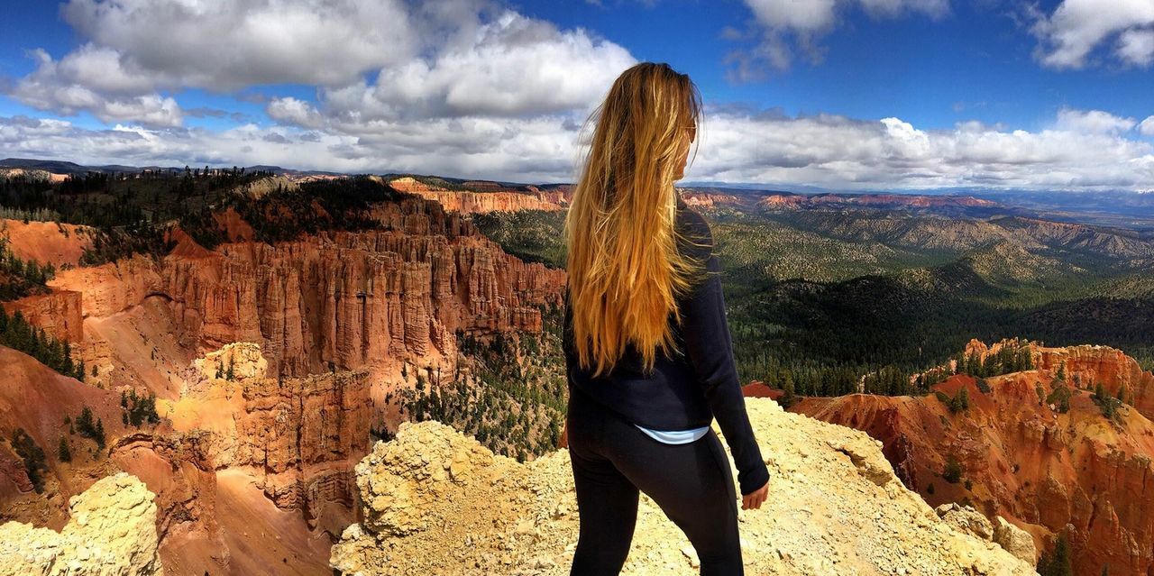 Rear view of woman against sky at bryce canyon national park