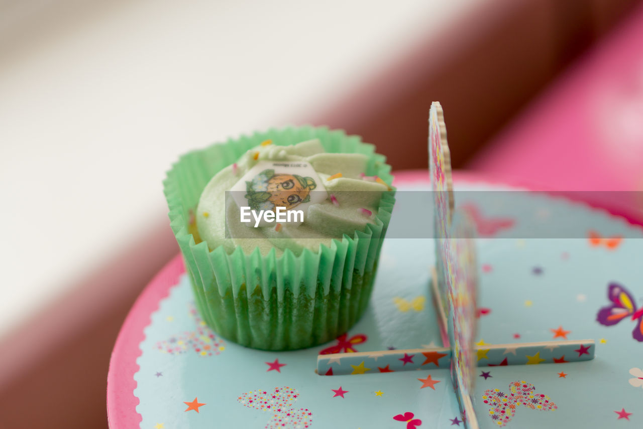 Close-up of cupcakes on table