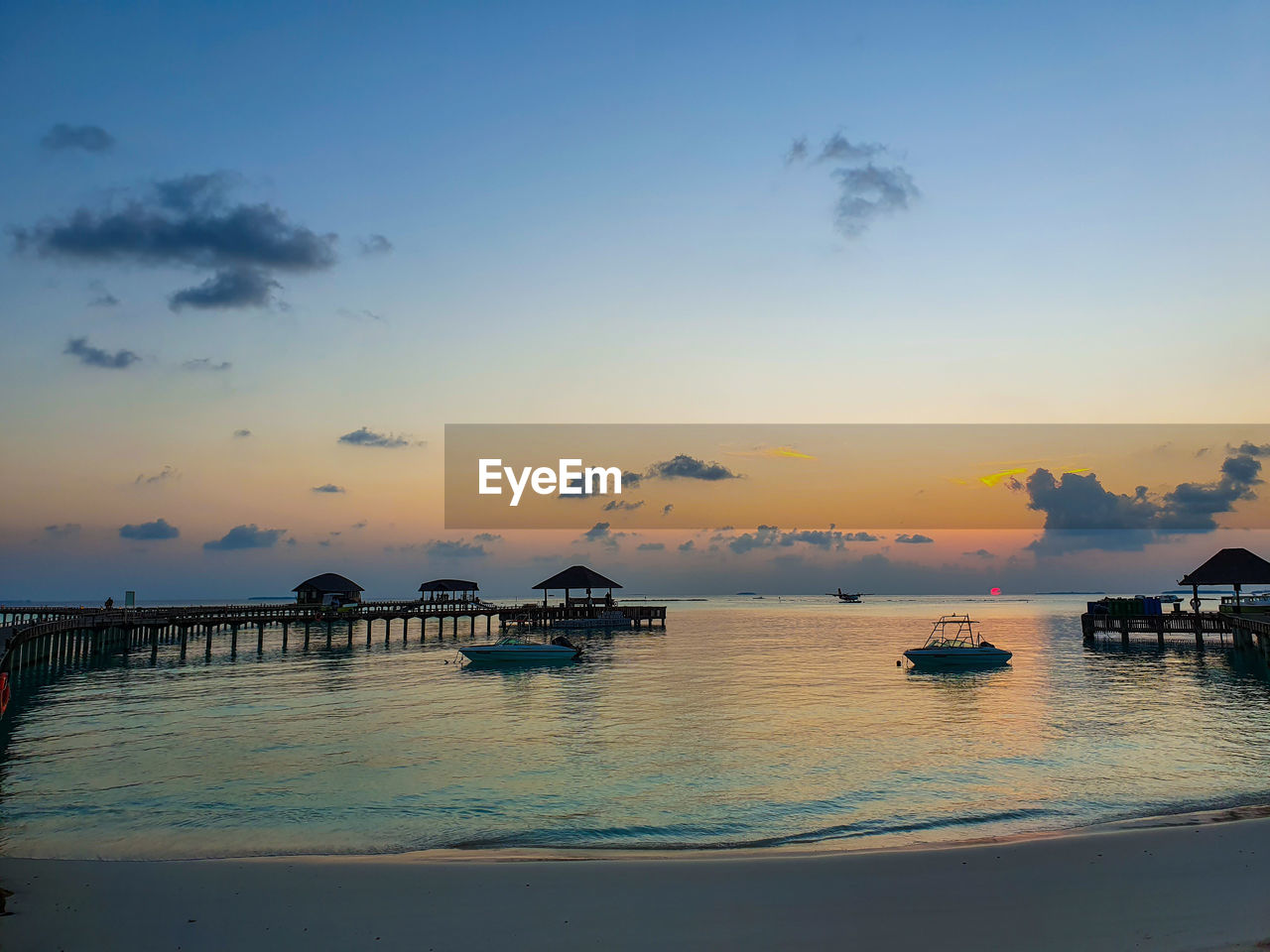 SCENIC VIEW OF SEA DURING SUNSET