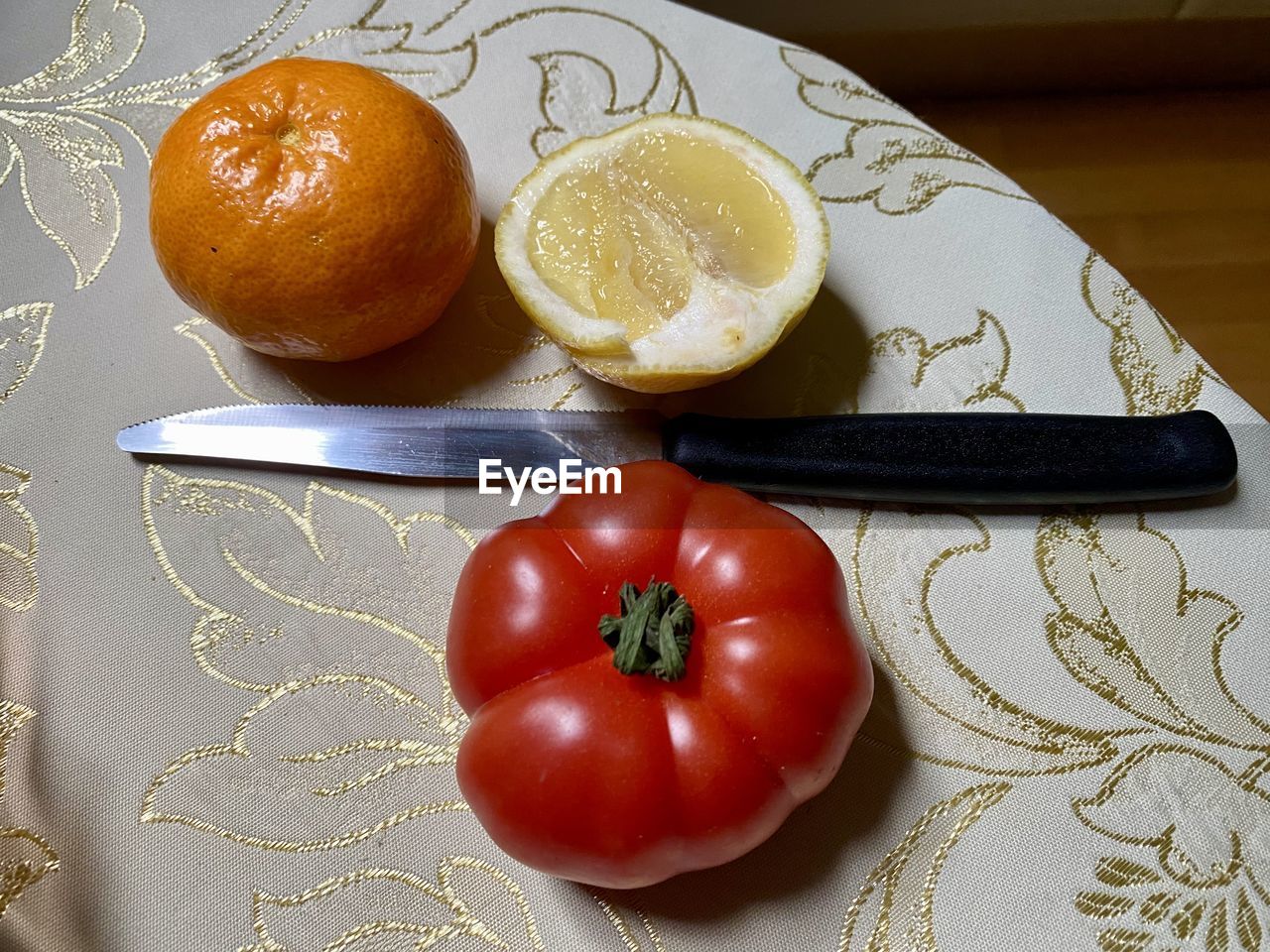 food and drink, food, plant, healthy eating, fruit, freshness, wellbeing, produce, tomato, no people, indoors, vegetable, still life, high angle view, table, clementine, plate, citrus fruit, dish, red, citrus