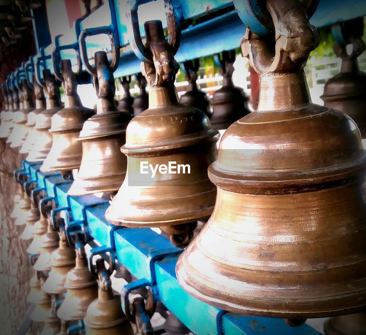 Close-up of bells at temple